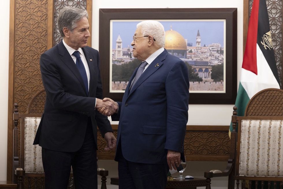 ​U.S Secretary of State Antony Blinken, shakes hands with Palestinian Authority President Mahmoud Abbas.