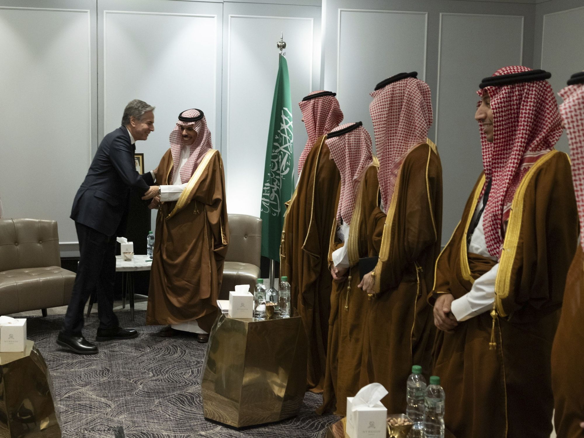​U.S Secretary of State Antony Blinken shakes hands with Saudi Foreign Minister Prince Faisal bin Farhan Al Saud.