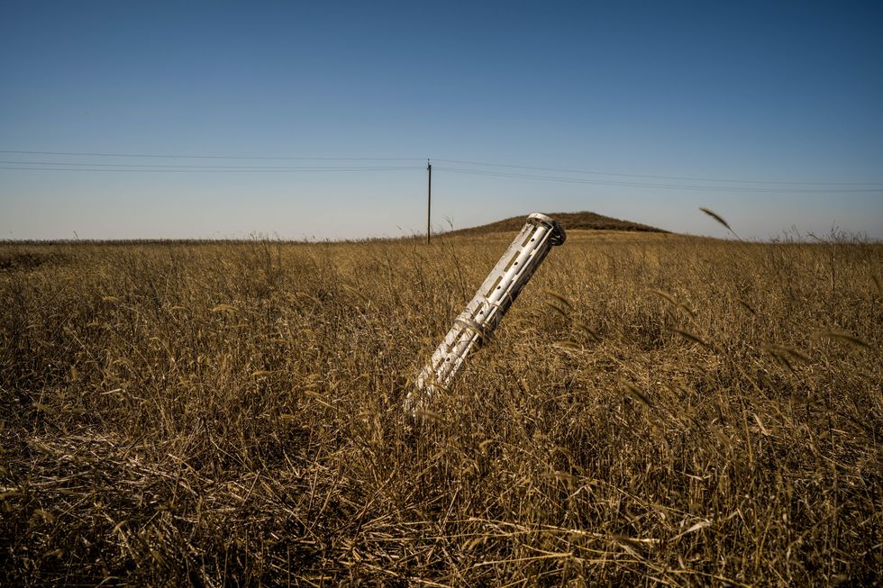 ​Unexploded missile stuck in the ground in a wheat field in southern Ukraine