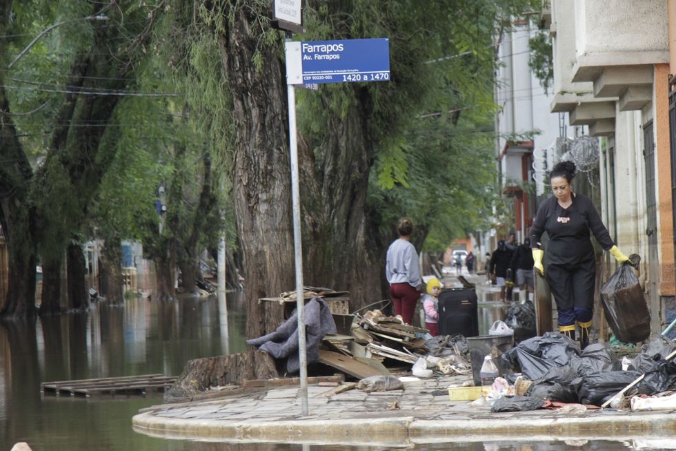 ​View of flooded streets and lots of rubbish along the streets of the capital of Porto Alegre.