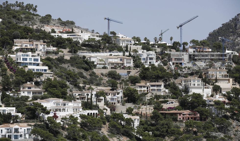 ​View of the luxury apartment buildings on the coast of Port Andratx, Spain, where foreigners already buy more than half of the real estate, June 17, 2022.