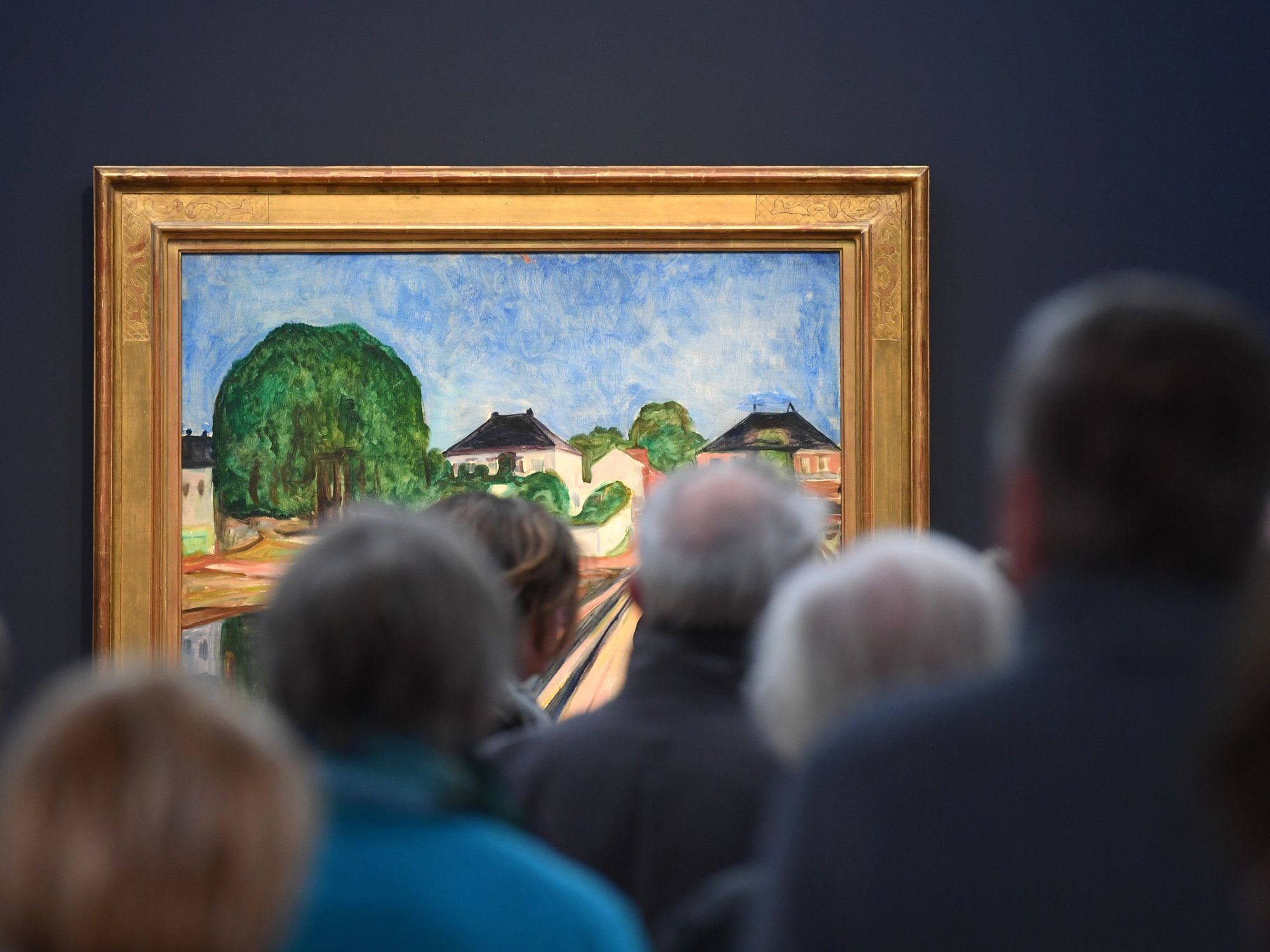 ​Visitors stand in front of the painting 'Girls on the bridge' by Edvard Munch worth 50 million Euro.
