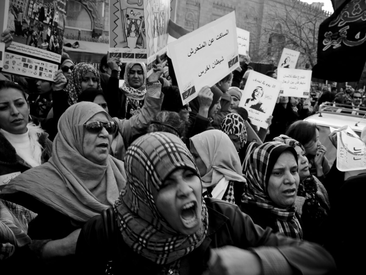 ​Woman participating in an anti sexual harrassment march in Tahrir.