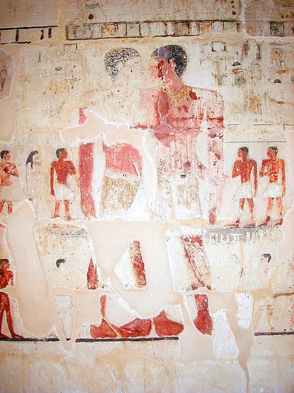 Egyptian drawing of two men and their children