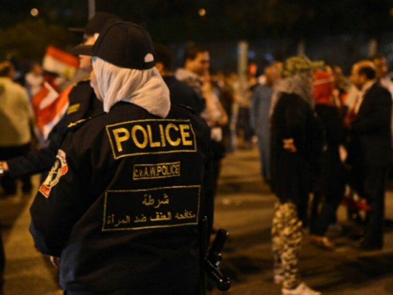 Egyptian Policewomen stand guard during a rally in Cairo