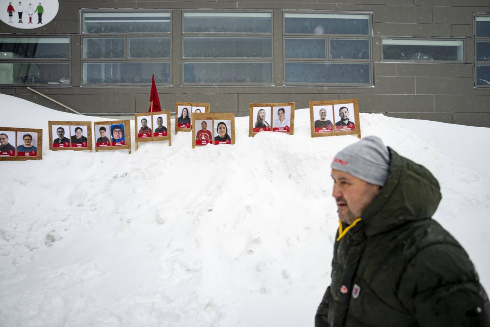 Election posters from the party Inuit Ataqatigiit before the election debate at GUX in Nuuk, Greenland, on Saturday, March 8, 2025.