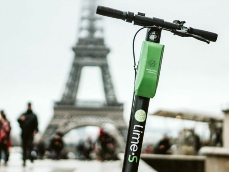 Electric scooters, like the pictured Lime, have taken Paris by storm