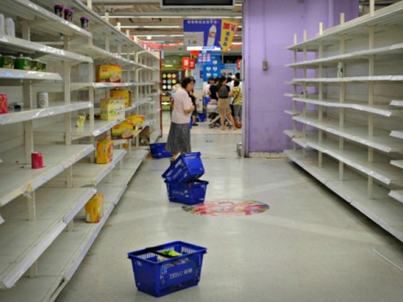 Empty shelves in a Tesco store in Changning, China