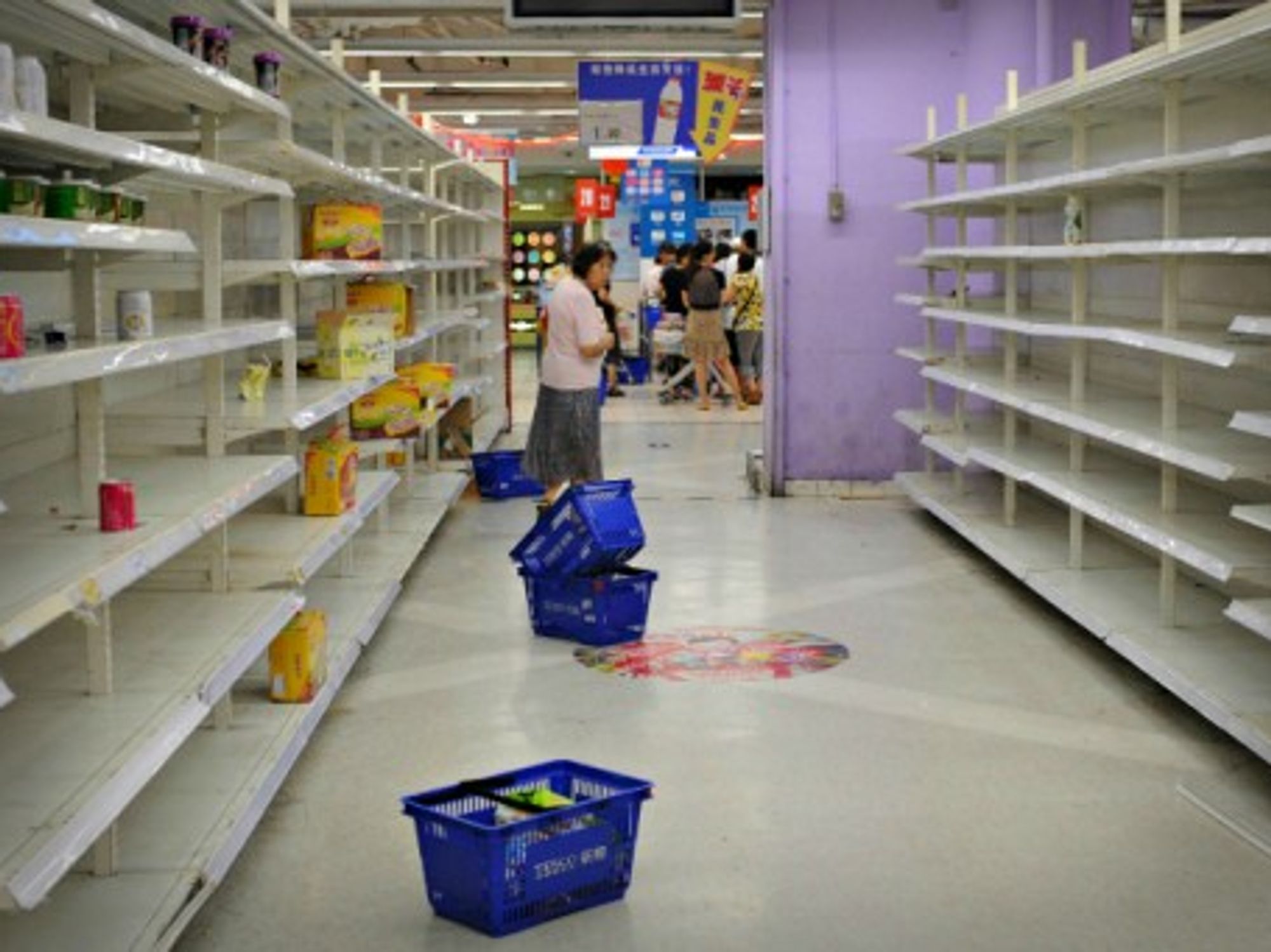 Empty shelves in a Tesco store in Changning, China