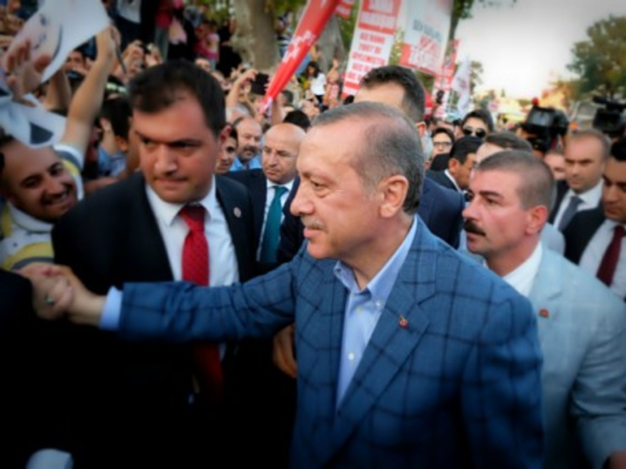 Erdogan saluting supporters in Istanbul late Sunday
