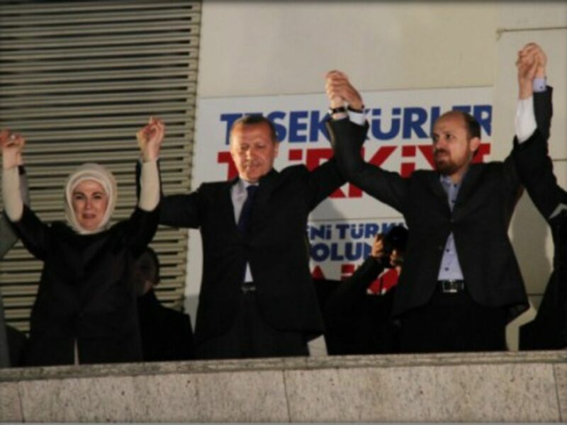 Erdogan (second from left) celebrates victory with his ruling party in the local elections
