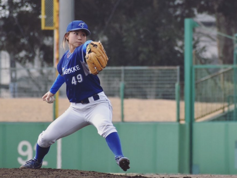 Eri Yoshida pitches a ball