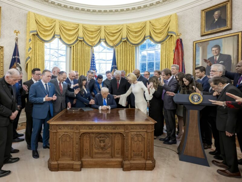 Evangelical Christians surround Donald Trump and pray in the Oval Office of the White House