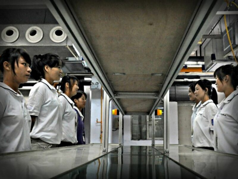 Factory workers in a 2010 file shot when the Foxconn factory opened in Zhengzhou