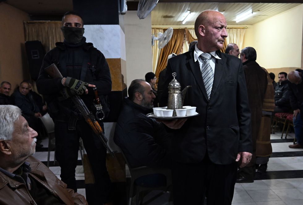 Families hold a wake at Aldemashqiah Funeral Home for the 101 prisoners of the neighborhood who died in prison under Bashar al-Assad.