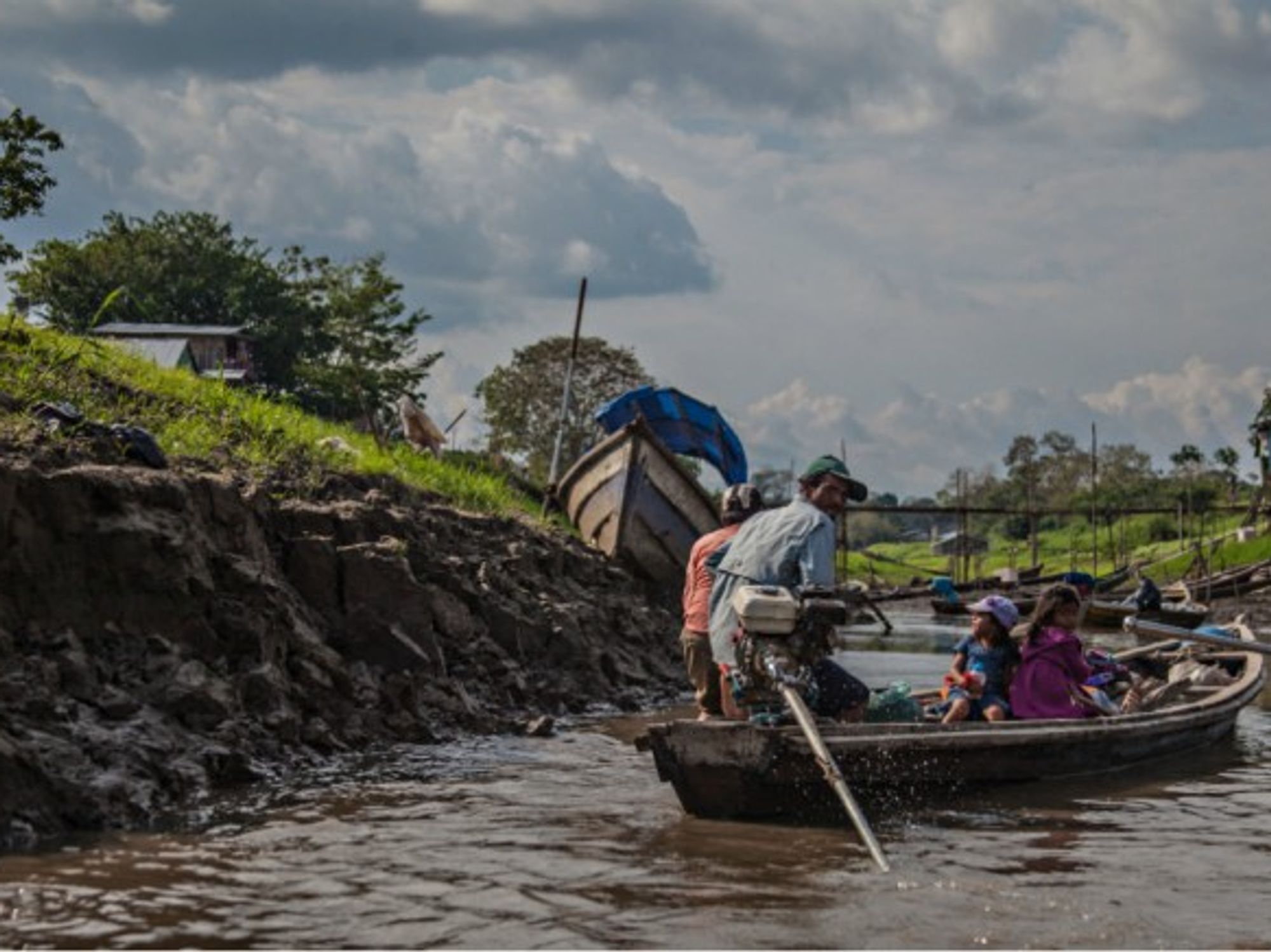 Family on the river in Leticia, Amazonas