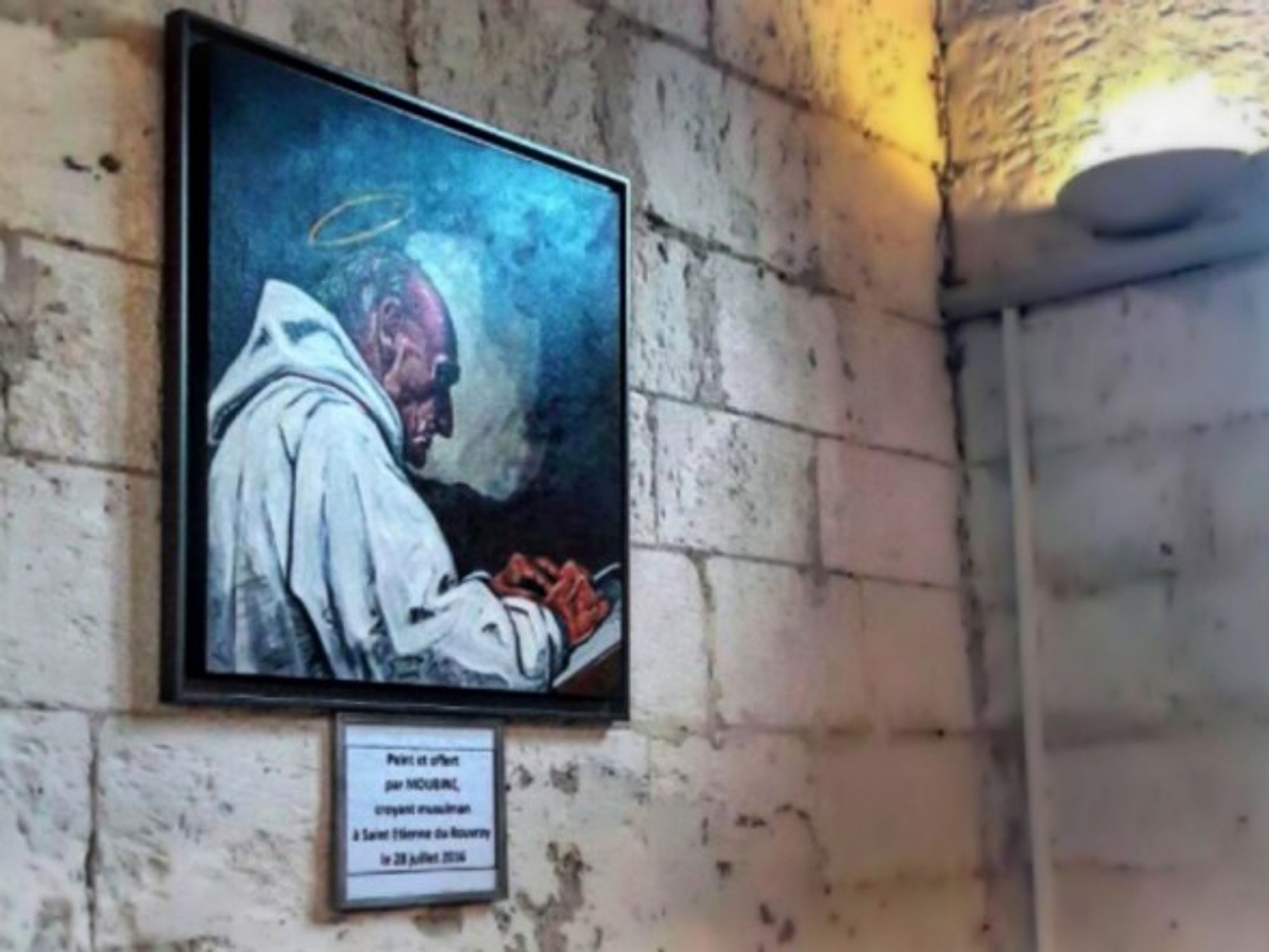Father Hamel as a saint, donated to the Saint-Étienne-du-Rouvray church by a Muslim painter