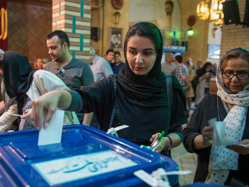 File photo of a woman voting in Tehran, Iran