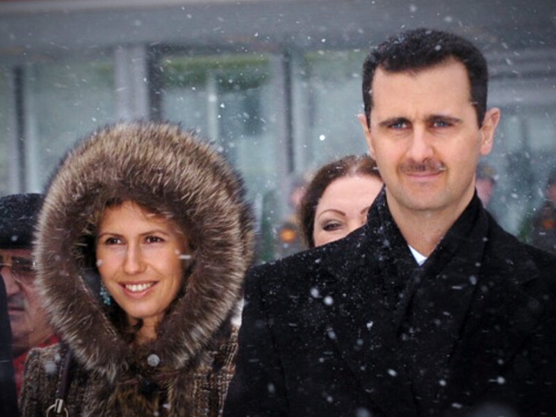 File photo of ​Bashar and Asma al-Assad in Moscow in January 2005