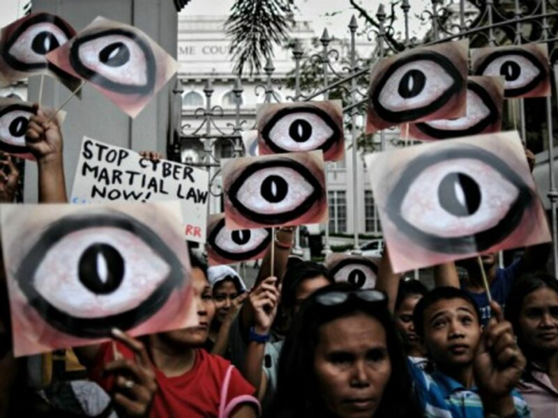Filipino protesters take part in global The Day We Fight Back protests