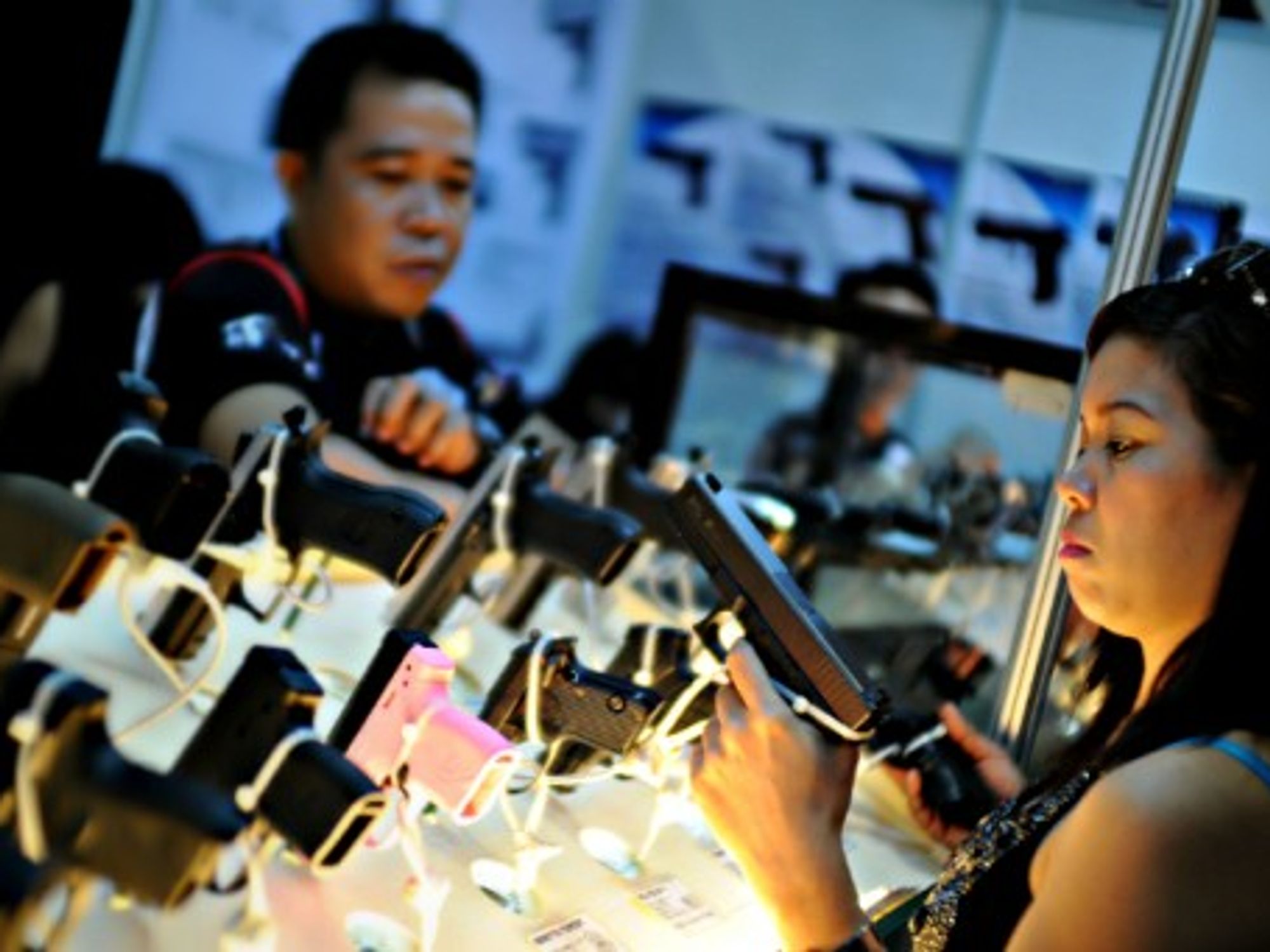 Filipinos at a gun show to promote responsible ownership in Mandaluyong