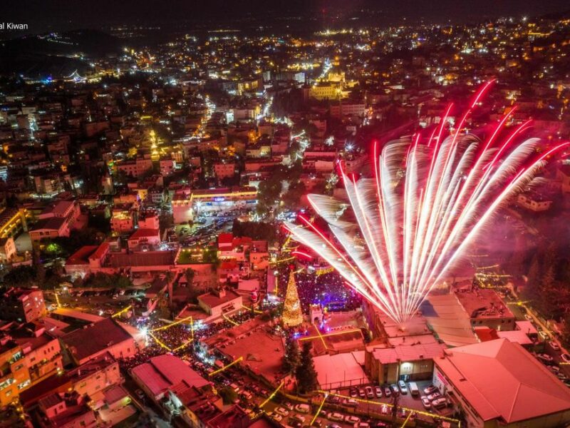 Fireworks during the inauguration of the Christmas tree lighting in the city of Nazareth, Israel.