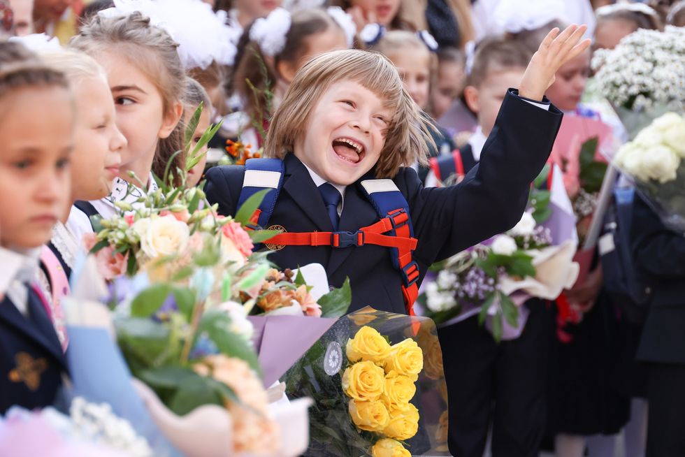 First-grade students at a ceremony for Knowledge Day on Sept. 1, 2023 in Moscow. The celebration marks the to start of a new academic year at secondary school No 152.