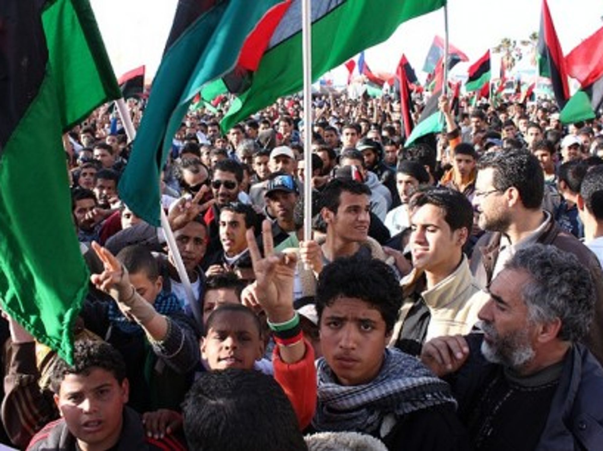 Flags these days are Libyan, but Benghazi is also loyal to the local FC al-Ahli club. (Al Jazeera)