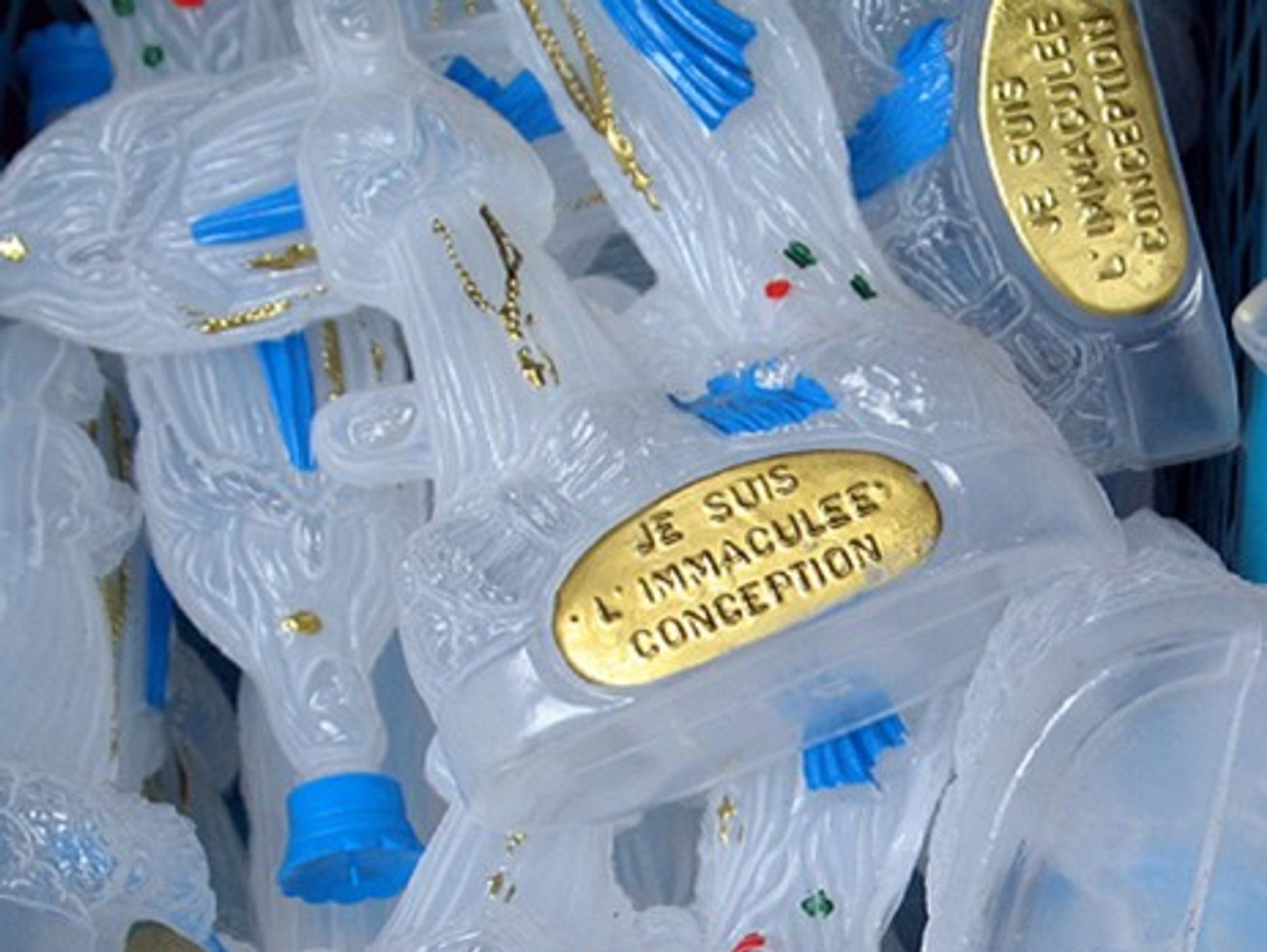 Flasks for collecting holy water from the cave of Massabielle in Lourdes (J-N Lafargue)