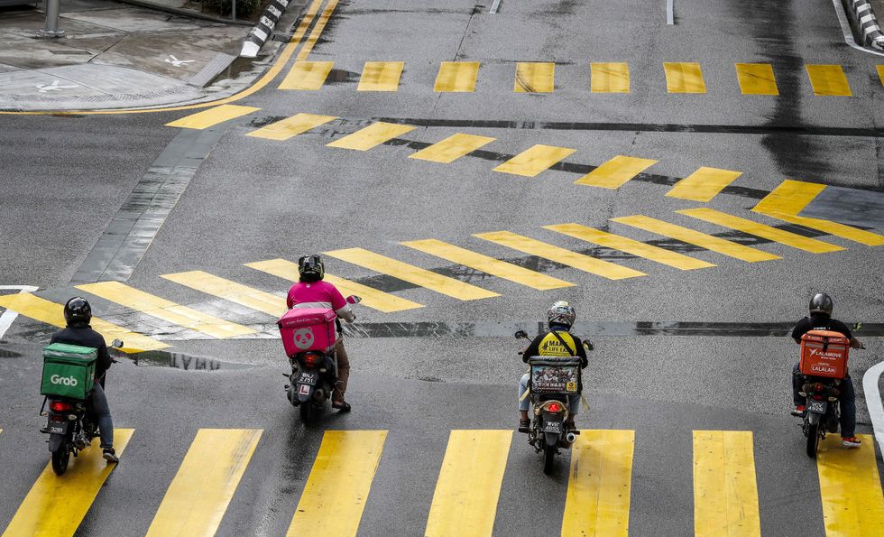 Food delivery riders in Kuala Lumpur, Malaysia