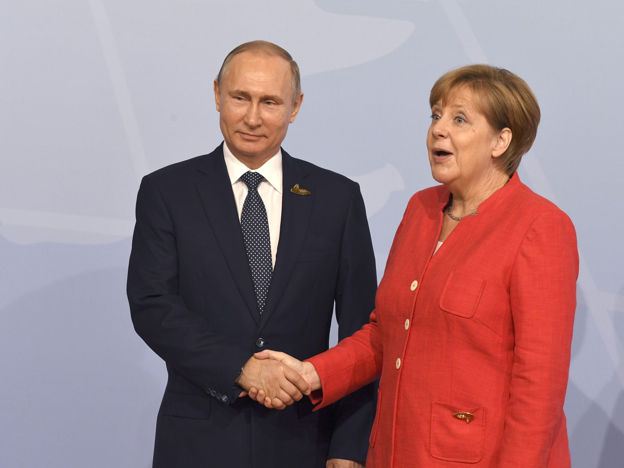Angela Merkel Defends Her Handling Of Putin