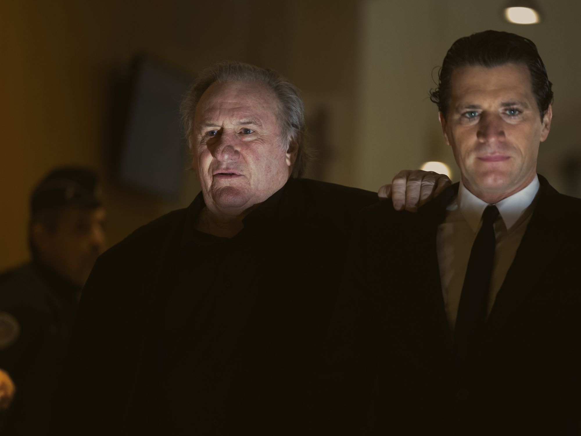 French actor Gerard Depardieu arrives with his lawyer Jeremie Assous (R) for his trial in which he is charged with sexually assaulting two women during a film shoot in 2021, at Paris criminal court​ on March 27, 2025