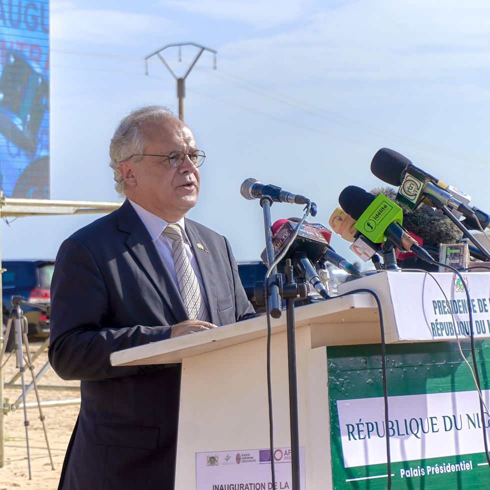 French ambassador to Niger Sylvain Itté makes a speech from a podium