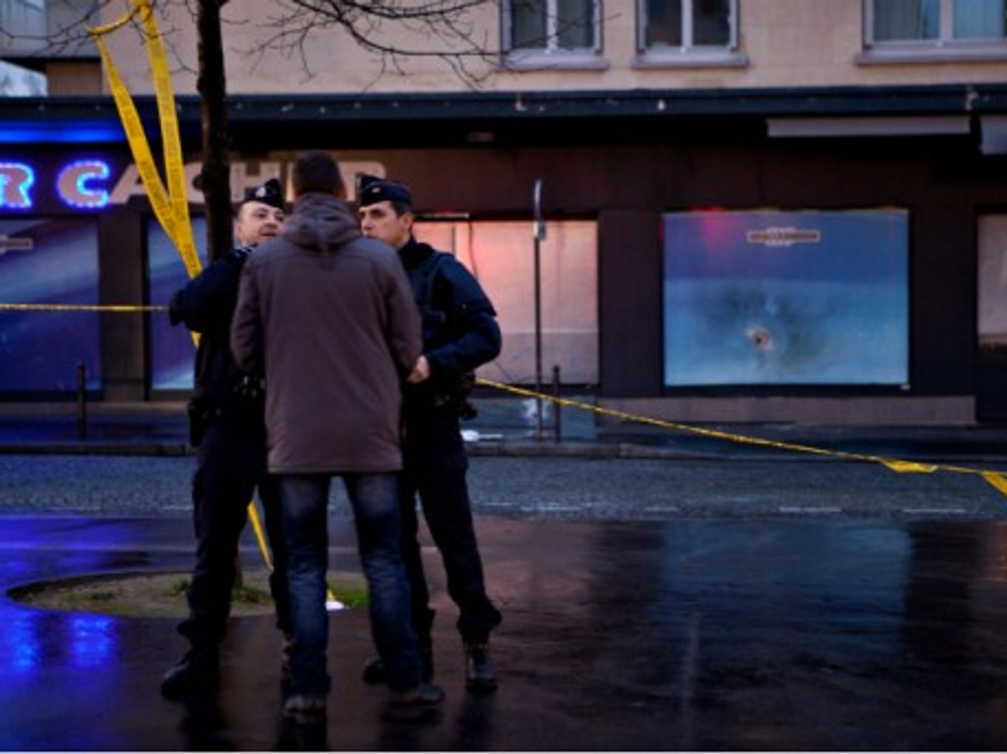 French policemen in front of the Paris supermarket attacked on Jan. 9