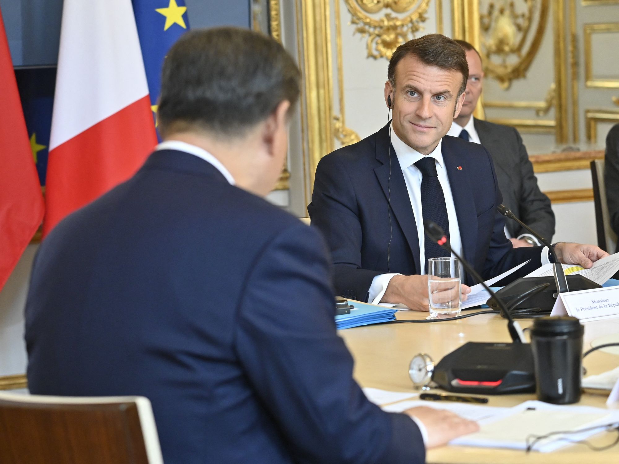 French President Emmanuel Macron, talks to Chinese President Xi Jinping during a trilateral meeting with European Commission President Ursula von der Leyen as part of the Chinese president's two-day state visit, at the Elysee Palace in Paris, France, on May 6, 2024.