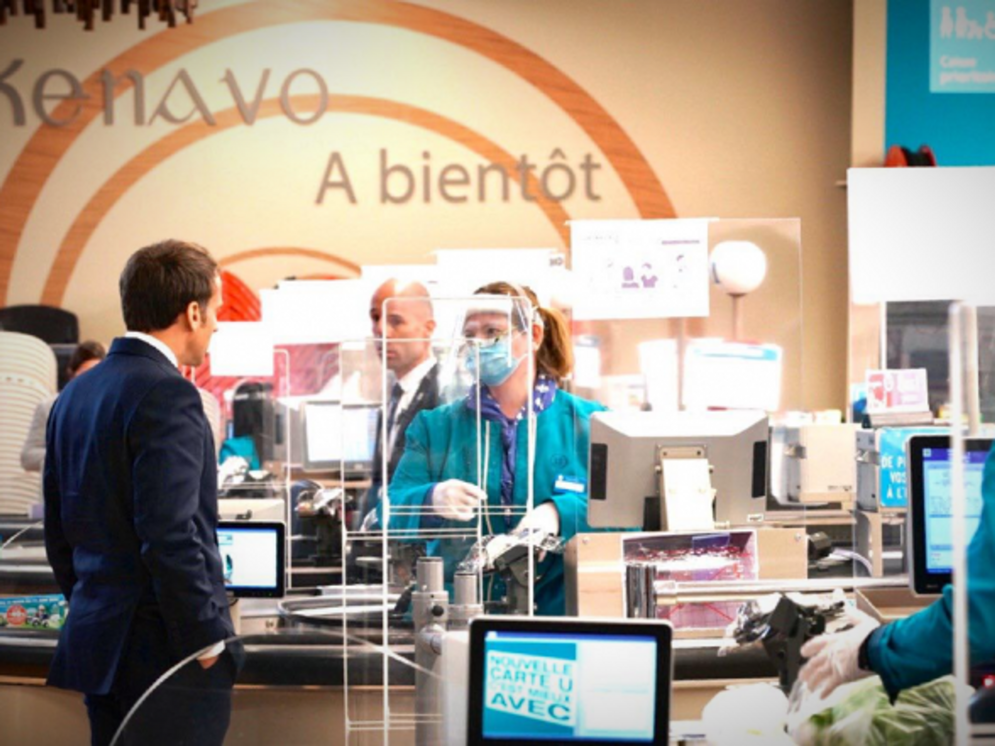 French President Emmanuel Macron visiting a supermarket in western France on April 22