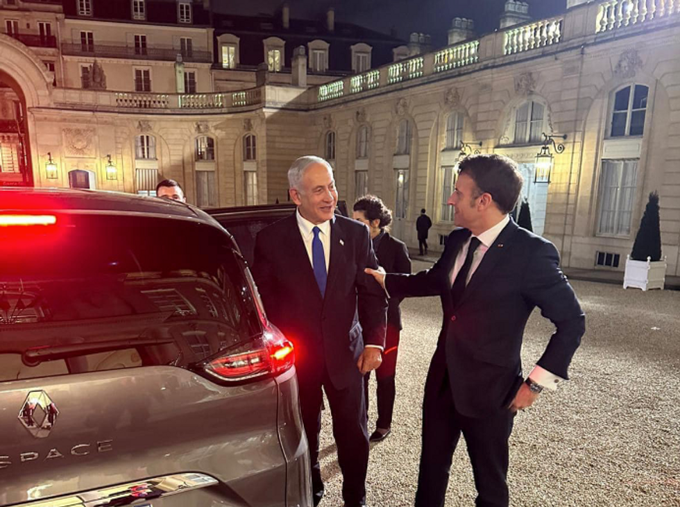 French President Emmanuel Macron welcoming Israeli Prime Minister Benjamin Netanyahu in Paris earlier this year