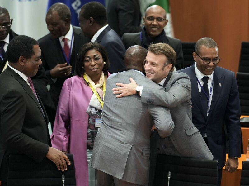 French President Emmanuel Macron welcoming participants to "Compact with Africa" - G20 Investment Summit 2023 confrence