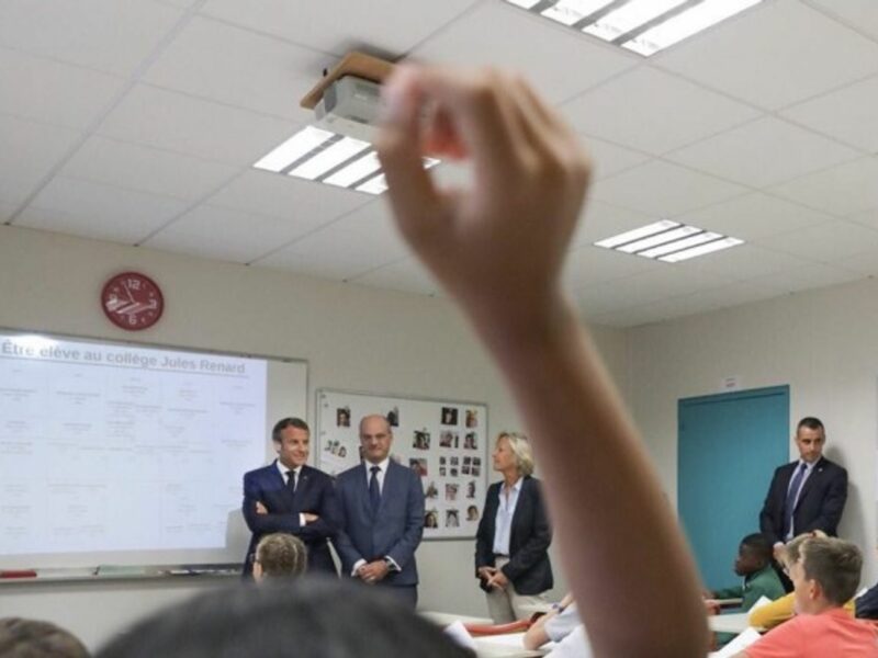 French President Macron in a classroom last September