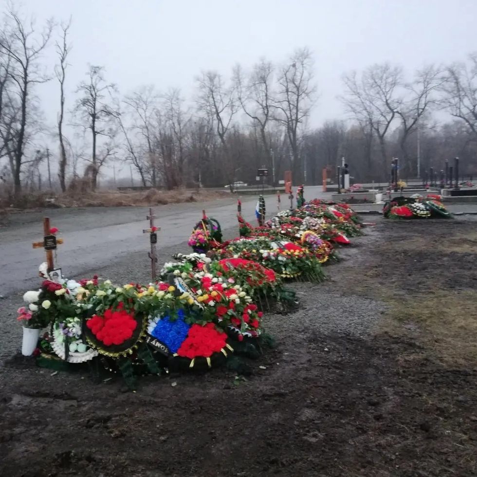 Freshly dug graves in the cemetery in Vladikavkaz, Russia, in March 2022.