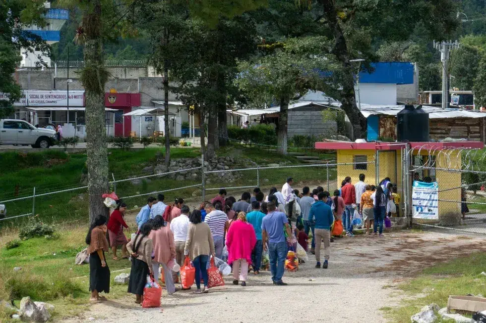 Friends and relatives form a line to visit people detained at CERSS 5, a prison in San Cristóbal de Las Casas.