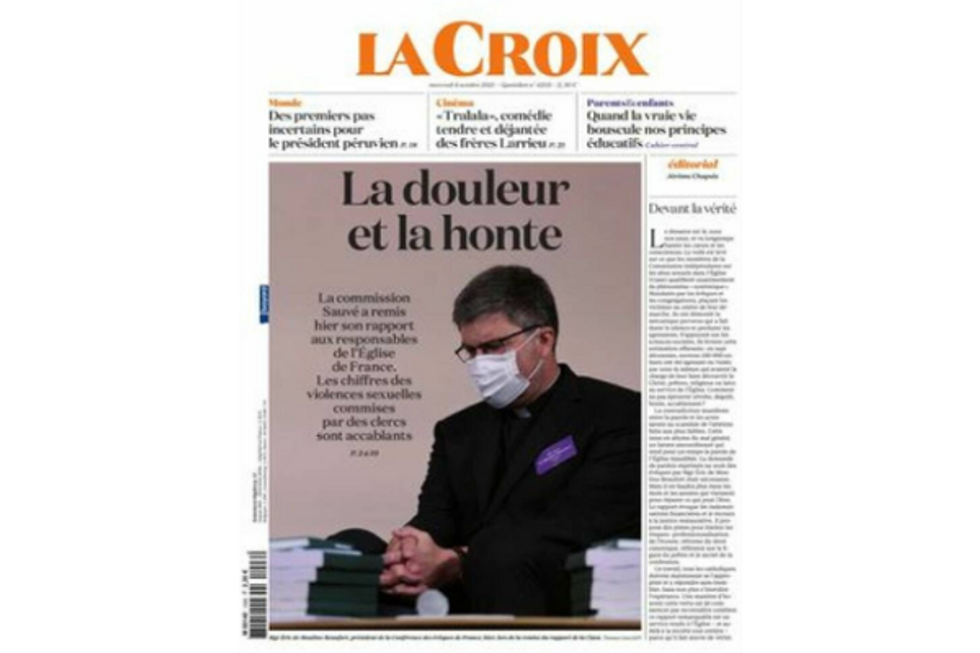 Front page of French daily La Croix titled "The pain and the shame" and featuring a photo of a French priest with a Cvodi mask on.