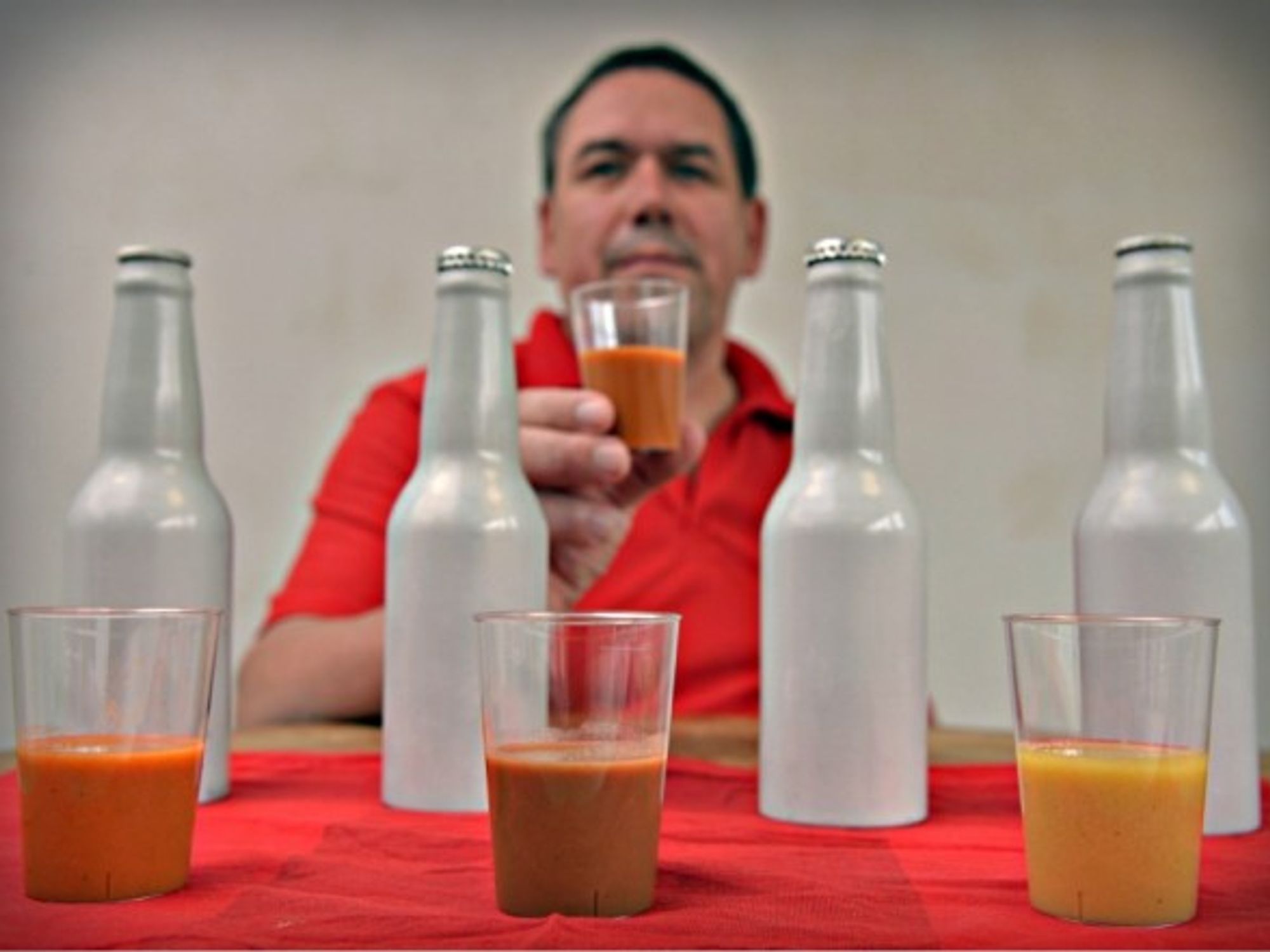 German butcher Peter Klassen presenting his meat drinks