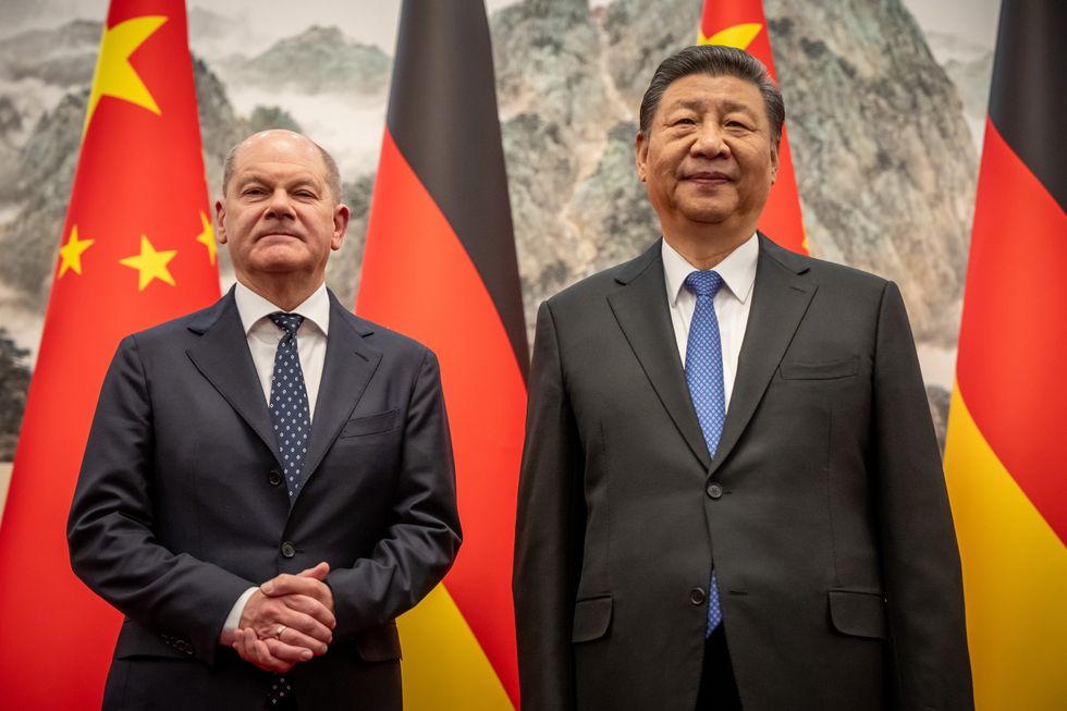German Chancellor Olaf Scholz is received in Beijing by Chinese President Xi Jinping. The meeting with Xi is the highlight of his three-day trip to China.