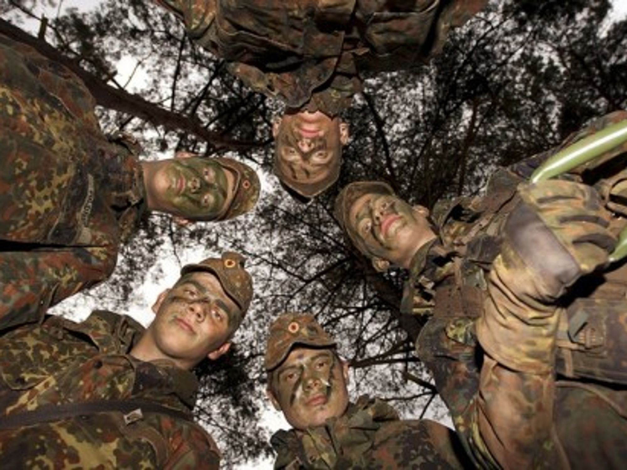 German soldiers in full camouflage (Bundeswehr/Stollberg)