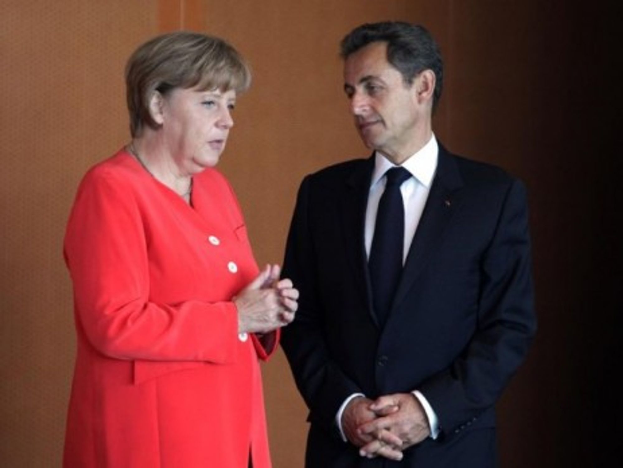 Germany's Angela Merkel and Nicolas Sarkozy of France