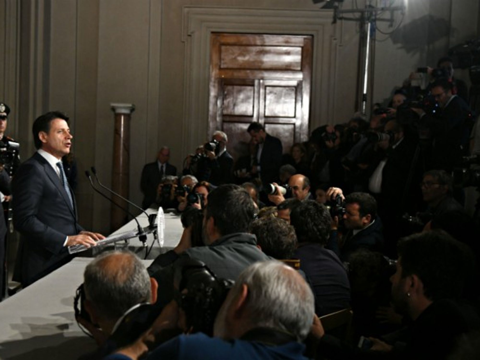 Giuseppe Conte addressing a press conference in Rome on May 23