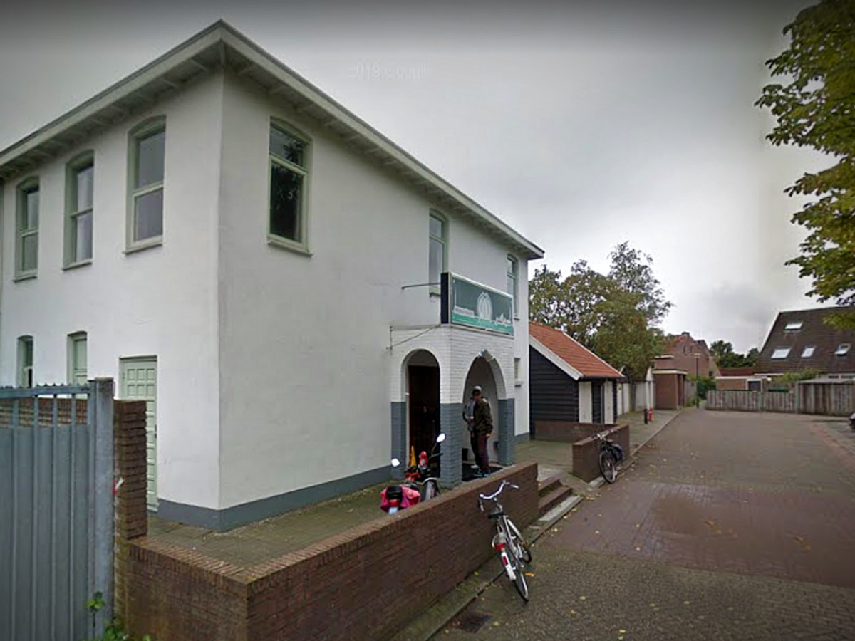Google Street View screenshot of men standing before the ​Nasser mosque in Veenendaal, one of the mosques reportedly surveilled