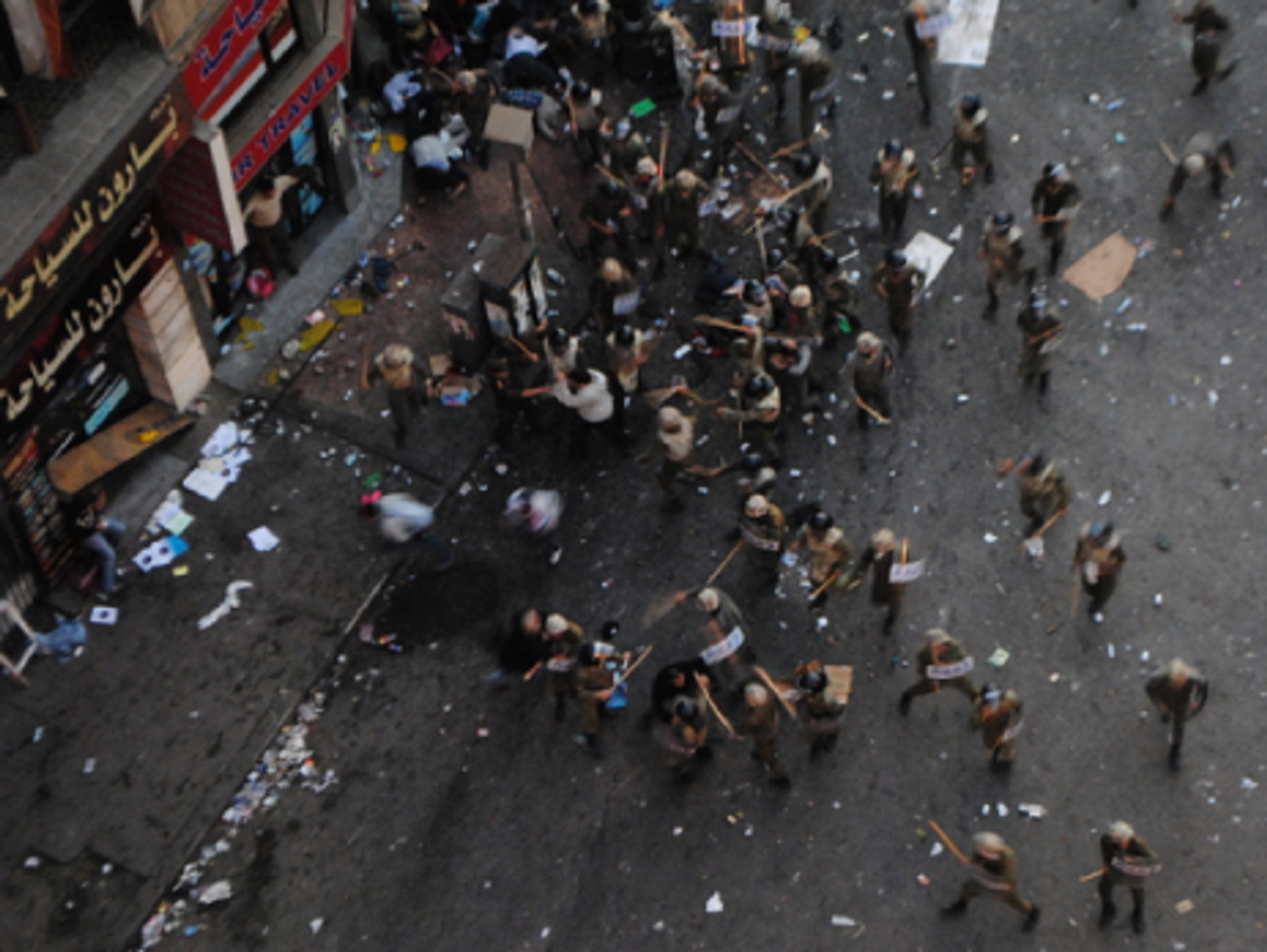 Government troops on Sunday beat demonstrators in Tahrir Square (lilianwagdy)