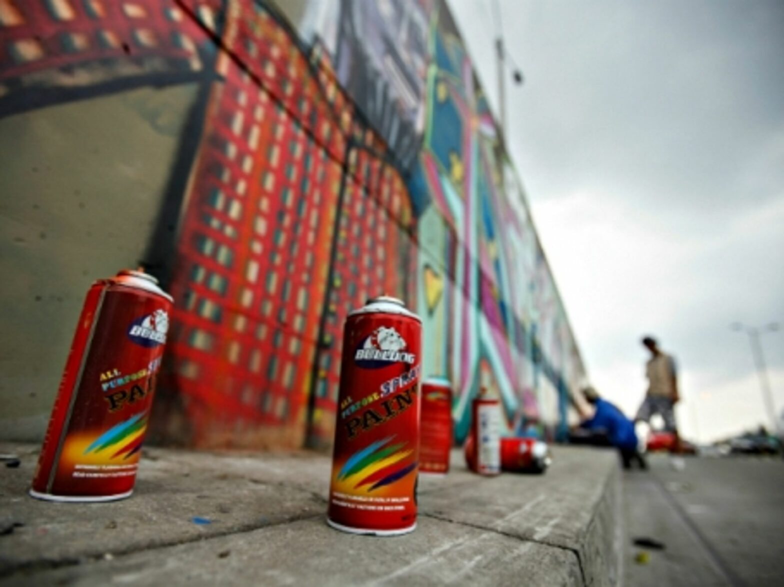 Graffiti artists at work in Bogota